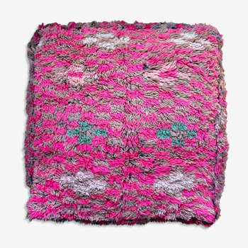 Colorful Moroccan Berber pouf with checkerboard pink brown and turquoise