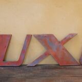 Letter to sign vintage metal "T".