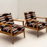 Pair of armchairs with bold geometric upholstery