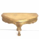 Small golden console