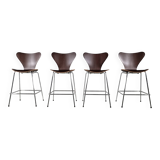 Set of 4 brown oak plywood bar stools by Fritz Hansen Series 7 by Arne Jacobsen.