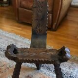 Old tripod milking chair