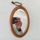 Mini antique walnut mirror from the 19th century.