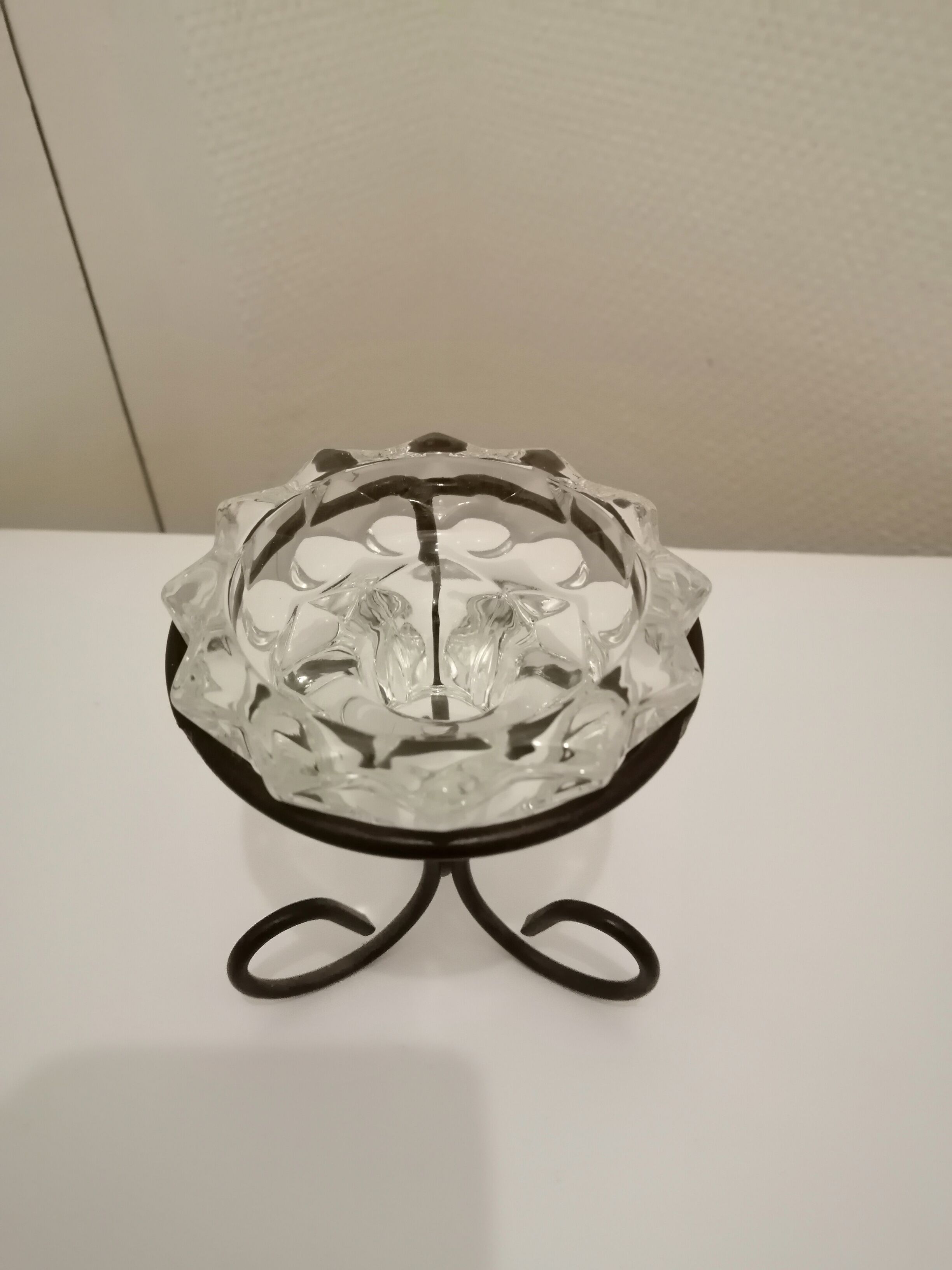 Metal base glass candle holder