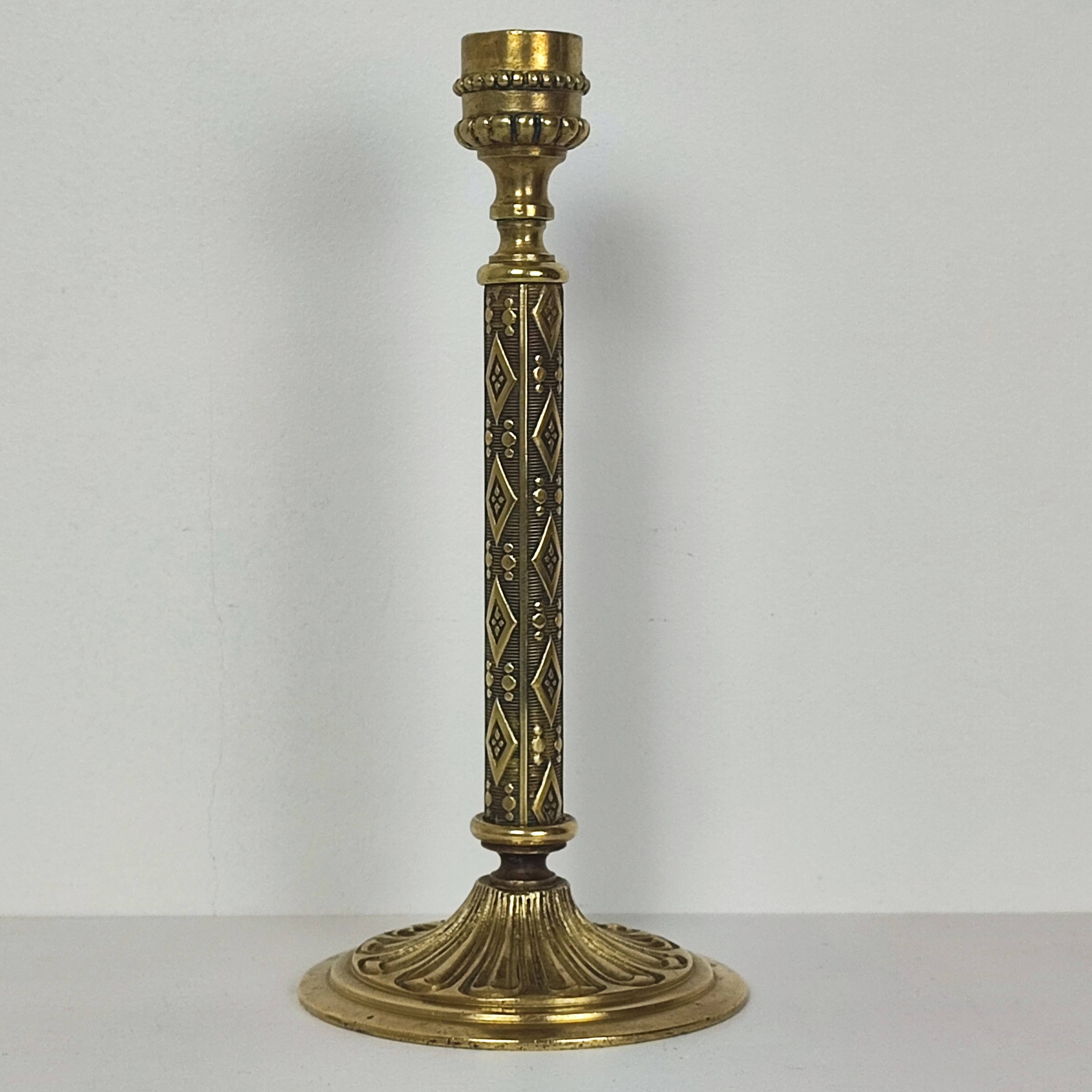 Gilt bronze candle holder
