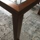 Table merisier plateau verre arbalète Roche Bobois