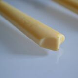 11 antique dessert knives from the 19th century with ivory-colored handles and a monogram