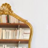 Old large shell mirror gilded with gold leaf