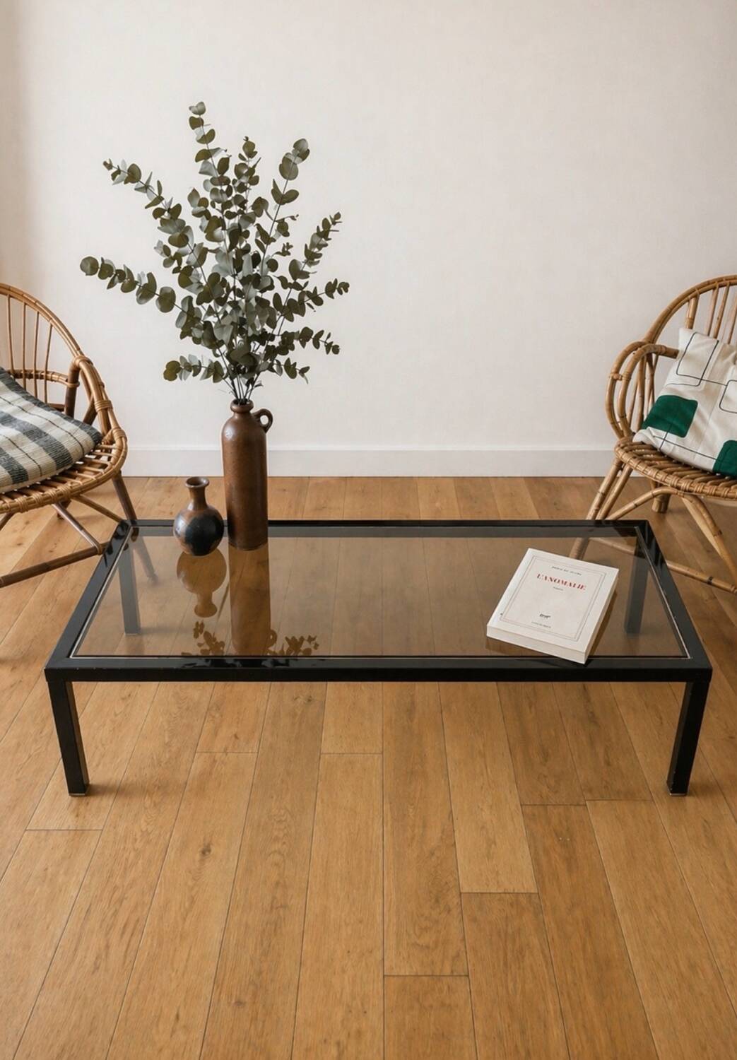 Smoked glass coffee table with chrome metal.