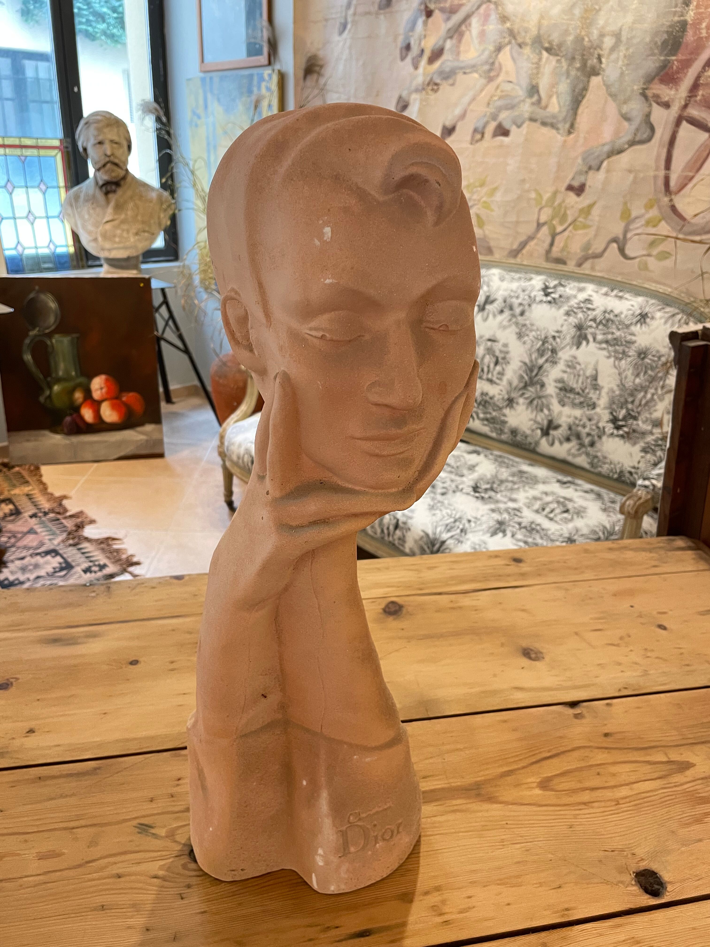 Christian Dior plaster face