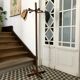 Wooden coat rack on foot