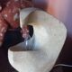 Sculpted stone lamp from the 1970s, signed.