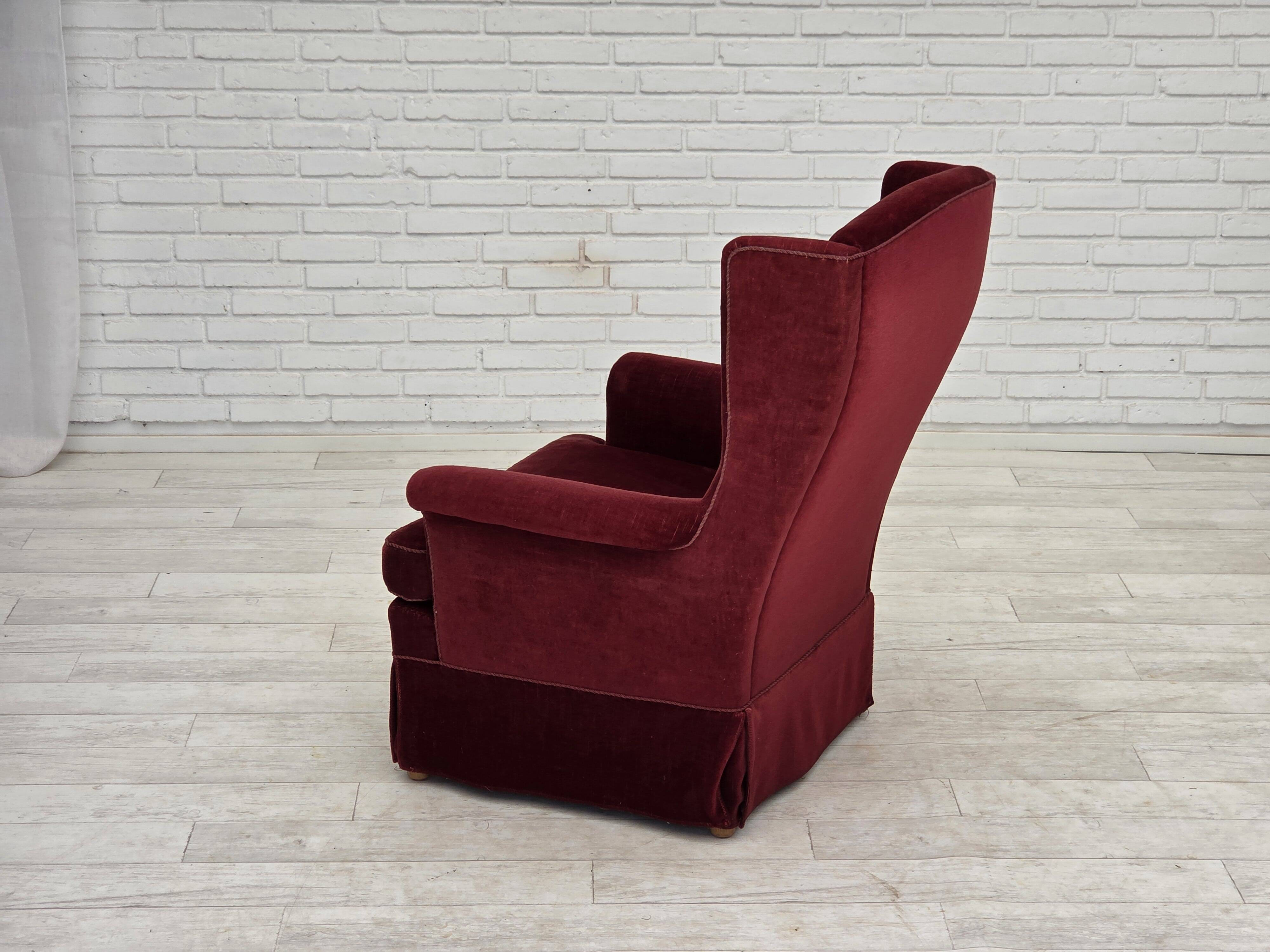 1970s, Danish highback chair, cherry-red furniture velour, ash wood legs.