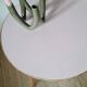 Round soft pink rattan table