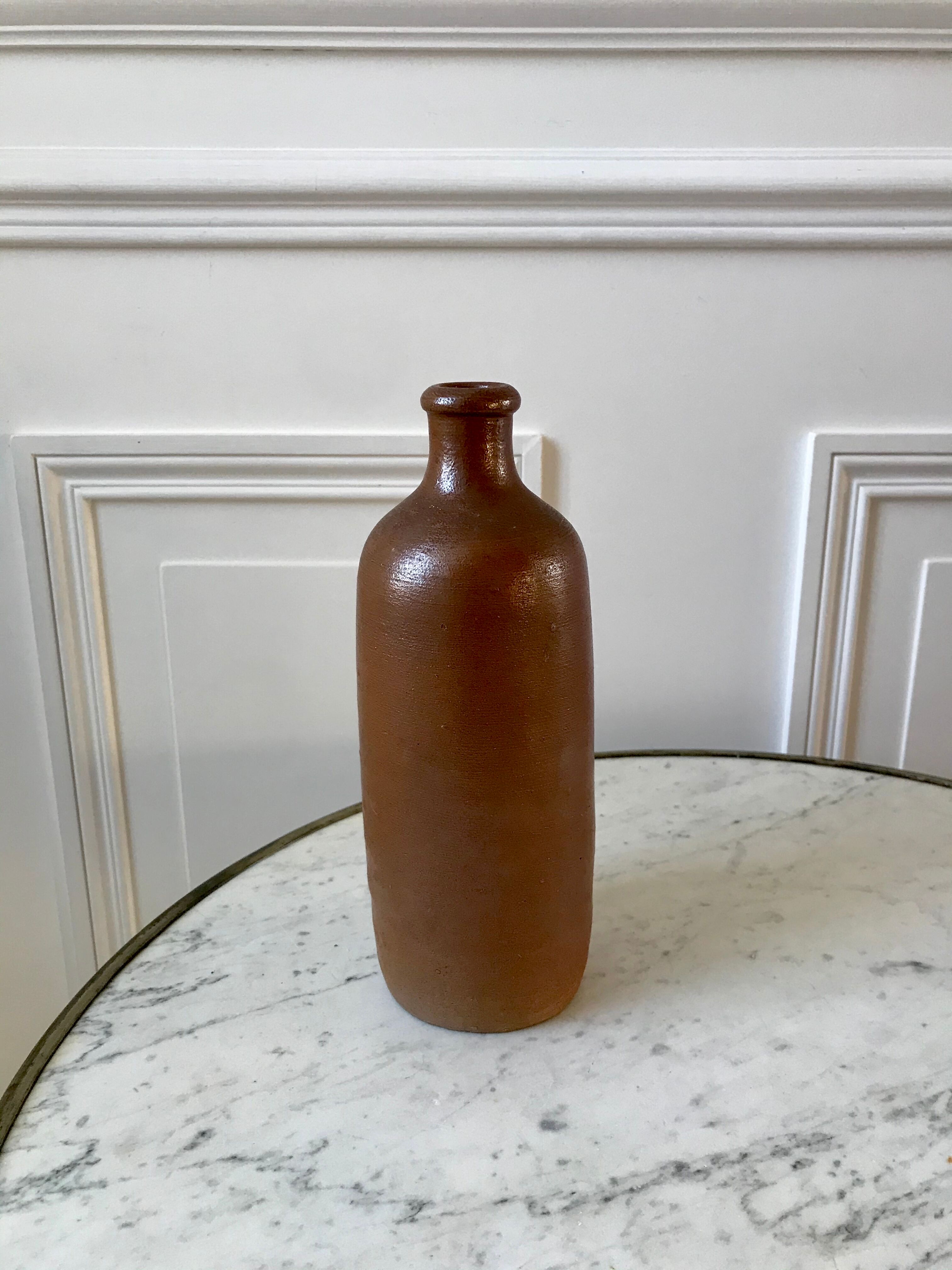 Stoneware bottle handmade early twentieth century