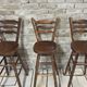 3 vintage wooden bar stools from the 60s/70s with a bistro spirit.