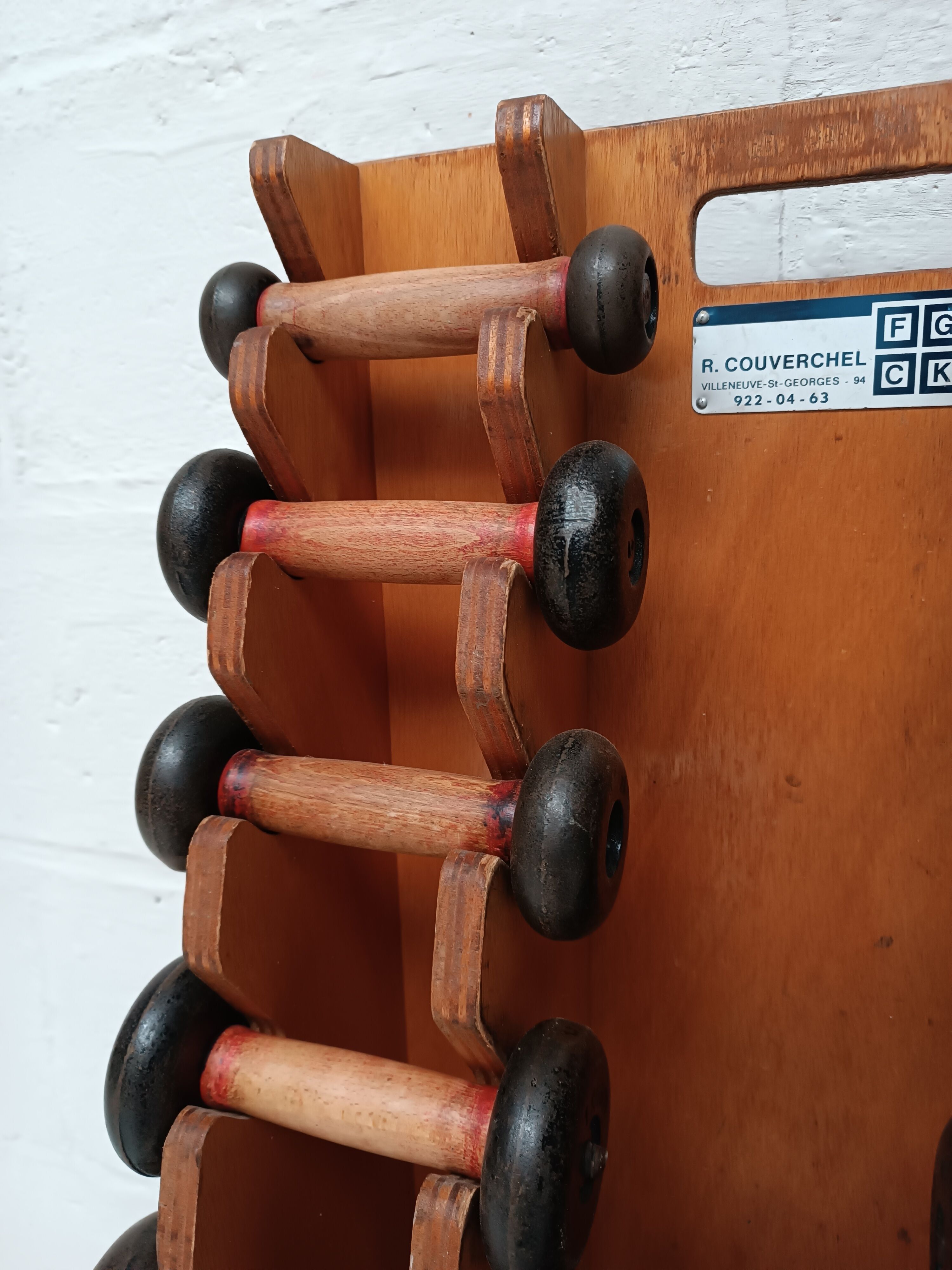 60s dumbbell wall display