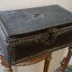 Box, trunk, covered in leather and adorned with metal inserts. 17th century.