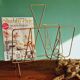 Golden metal magazine holder