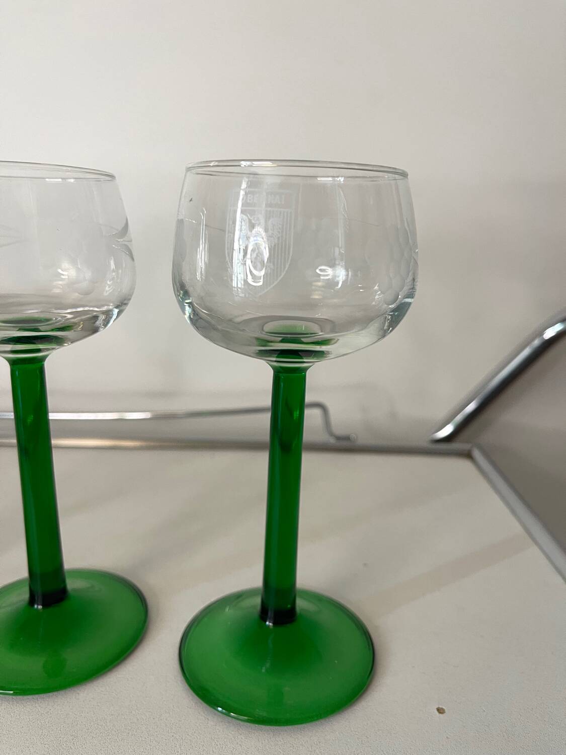 Set of 4 antique Alsace wine glasses, green stem and engraved decoration