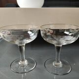 Set of 6 Baccarat-style champagne glasses. Stylized grape cluster decoration.