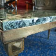 Coffee table in gilded bronze and green Alpine marble