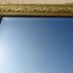Antique mercury mirror in the Napoleon III style.