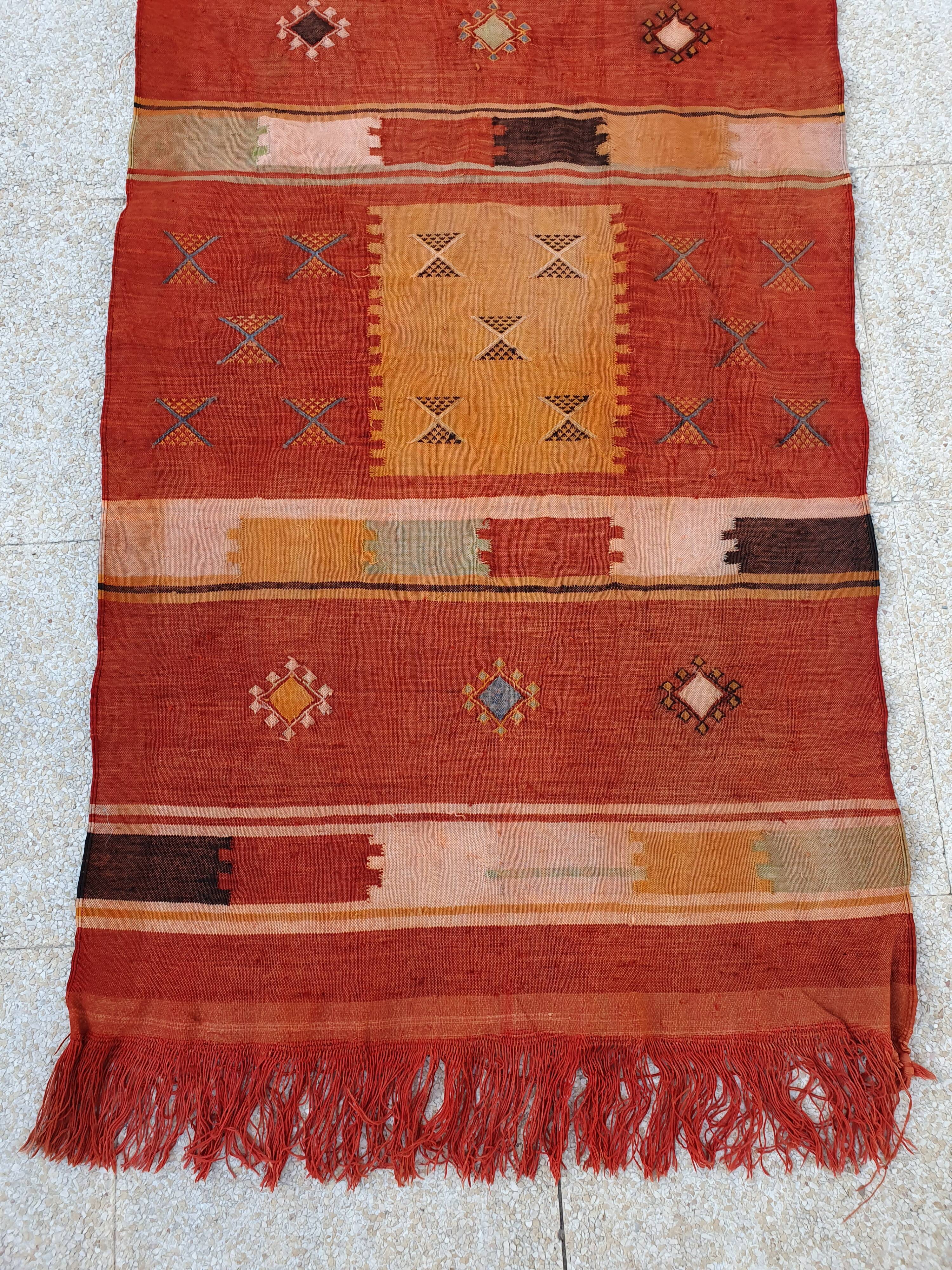 Orange red ethnic carpet 140x82 cm