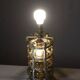 Vintage brutalist lamp with double lighting, blown glass in a cage, 20th-century design.