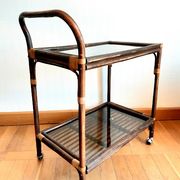 Rattan and smoked glass rolling service