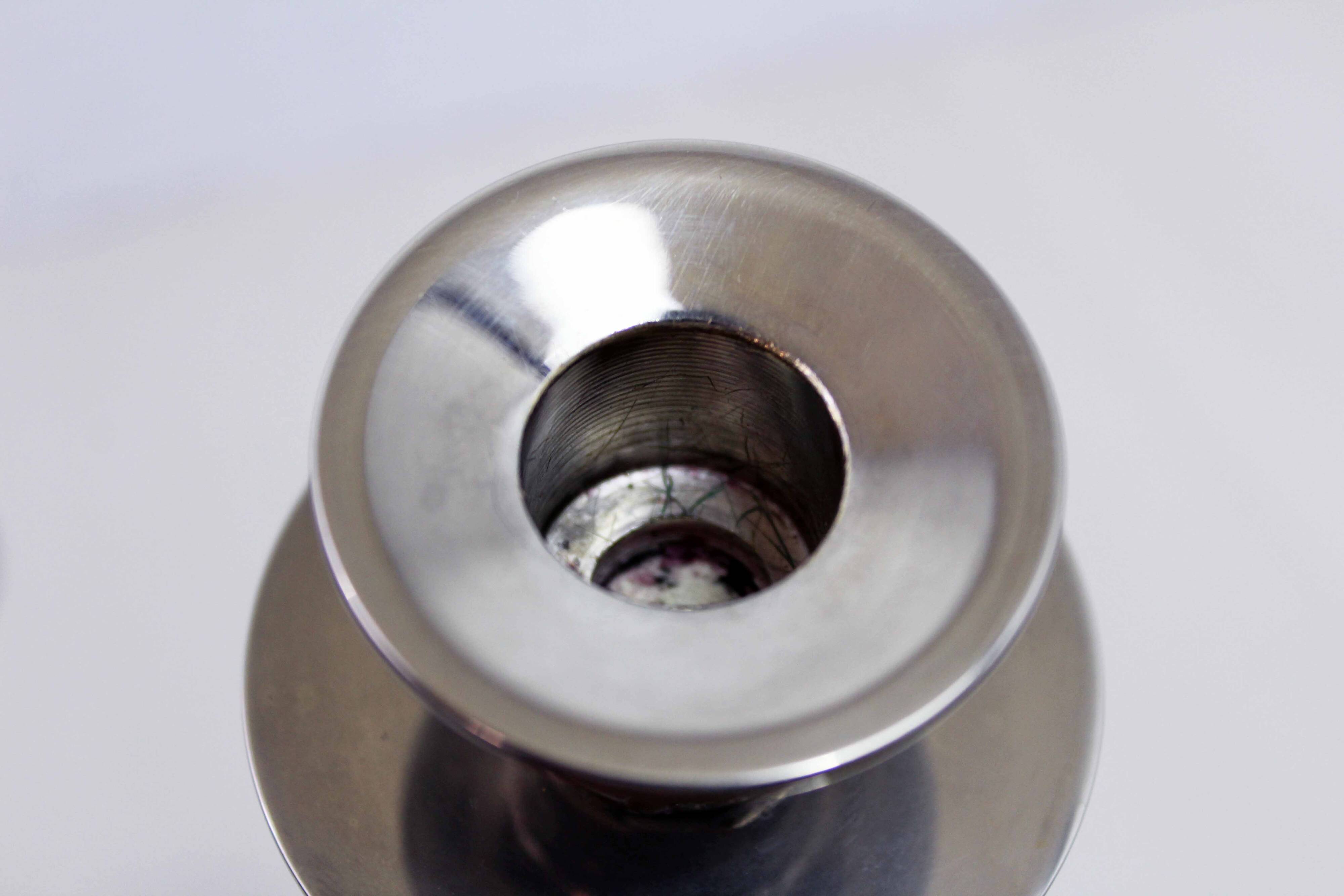 Pair of lucite and silver-plated metal candlesticks