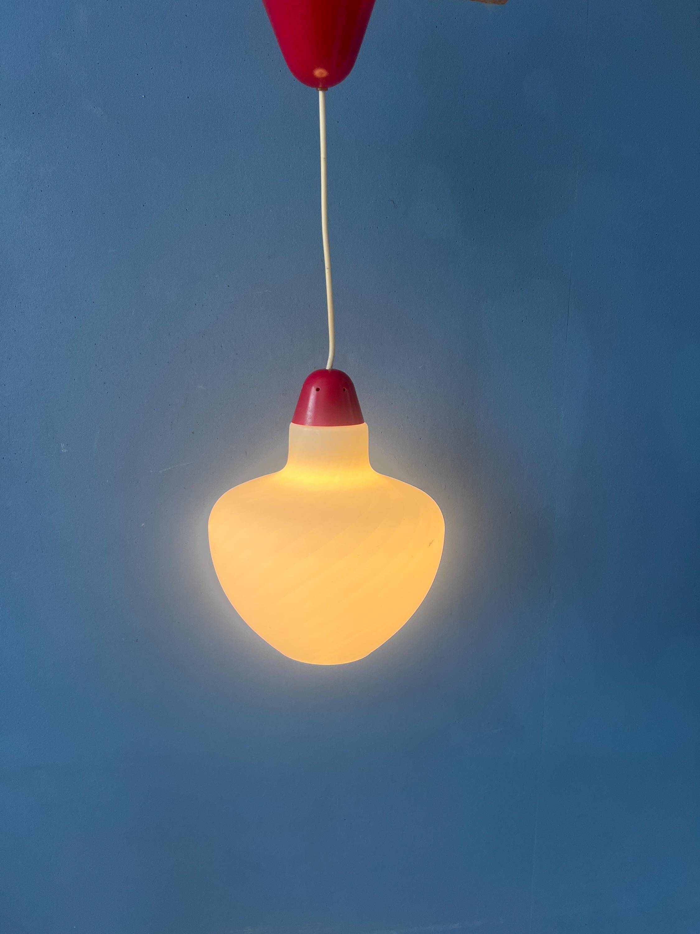 Mid-Century opaline glass suspension with a red upper part and ceiling cover.