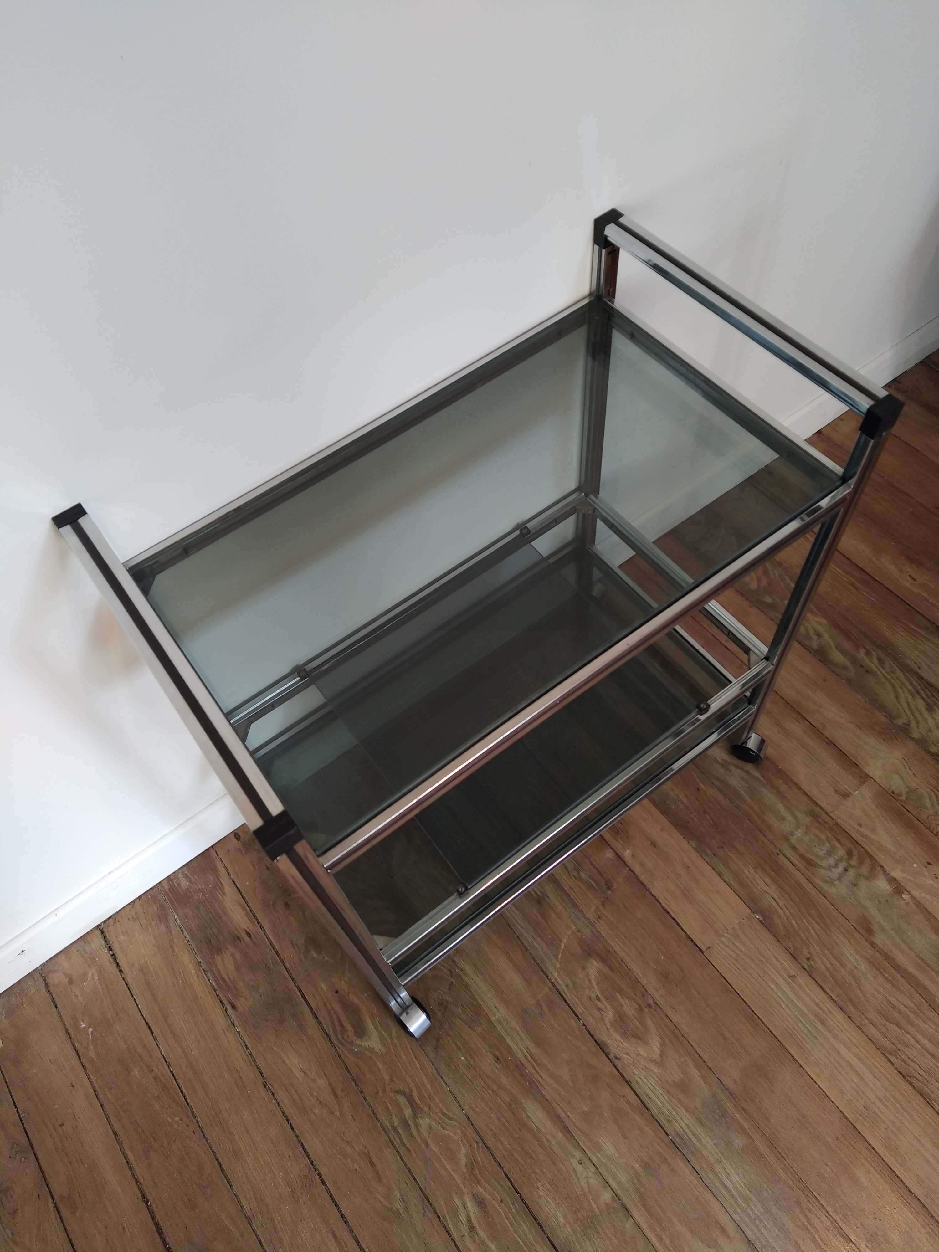 Stainless steel bar and smoked glass serving table