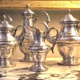 Silver-plated metal tea and coffee service in a 4-piece style.