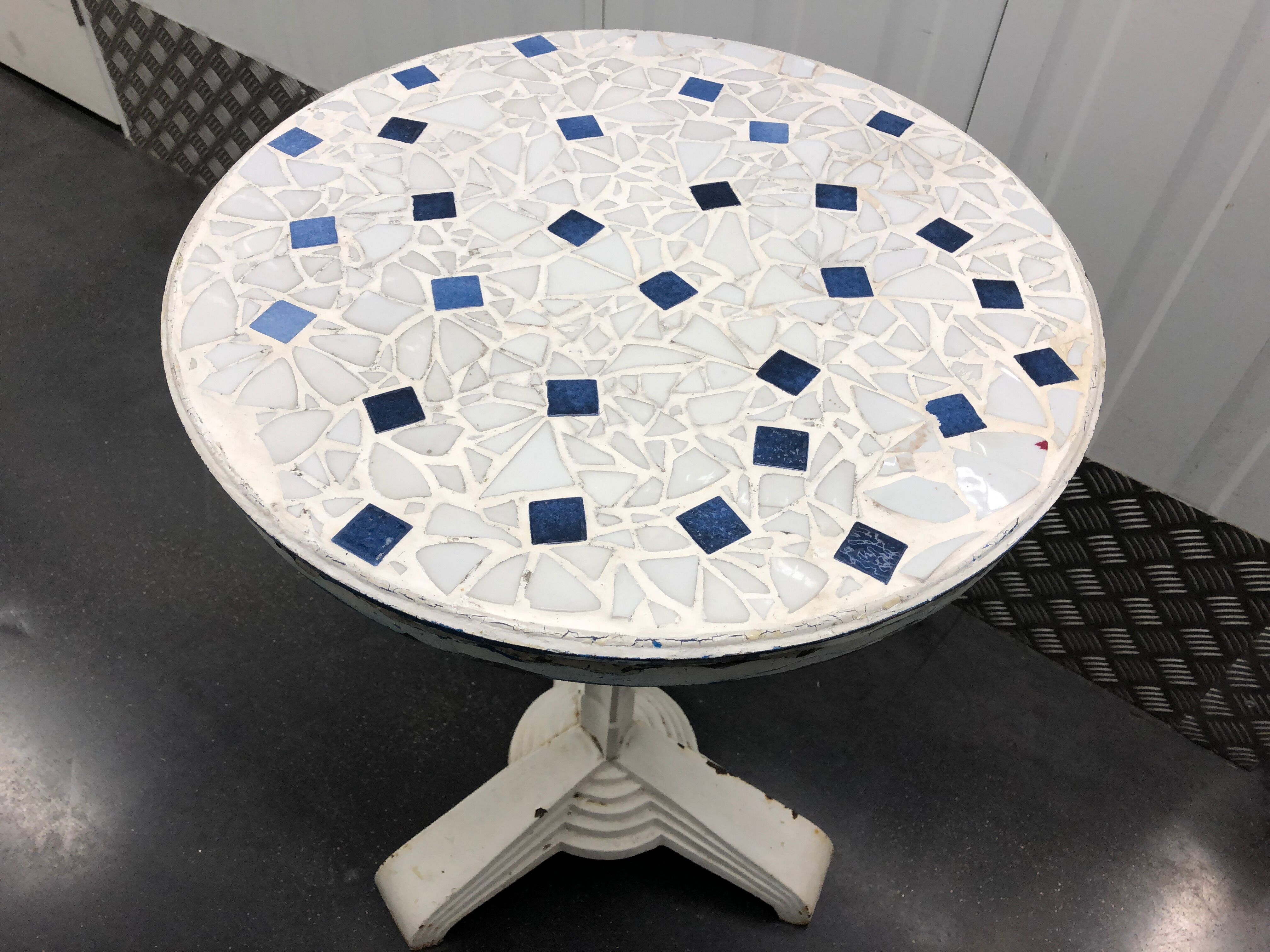 Art Deco cast garden table and porcelain shard tray