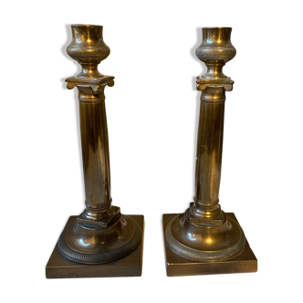 Pair of bronze candle holders