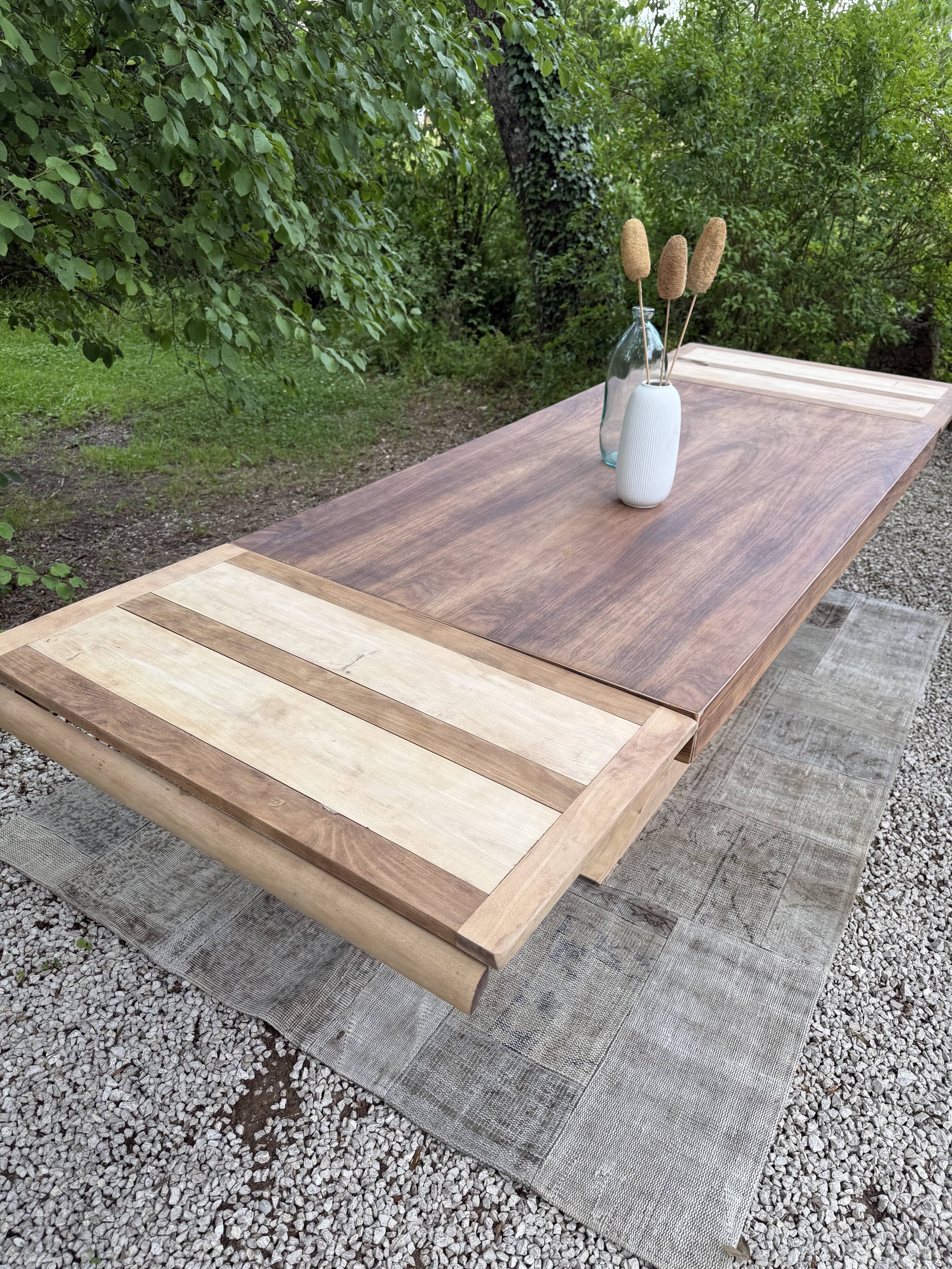 Renovated wooden table with extensions.