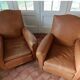 Paire de fauteuils club cuir