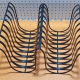 Minimalist metal magazine holder