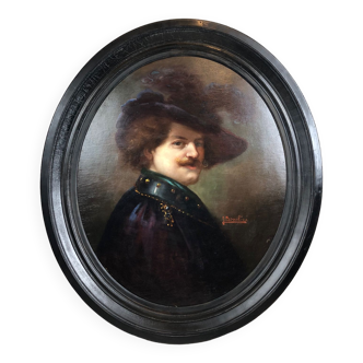 Portrait ovale d’un homme au large chapeau