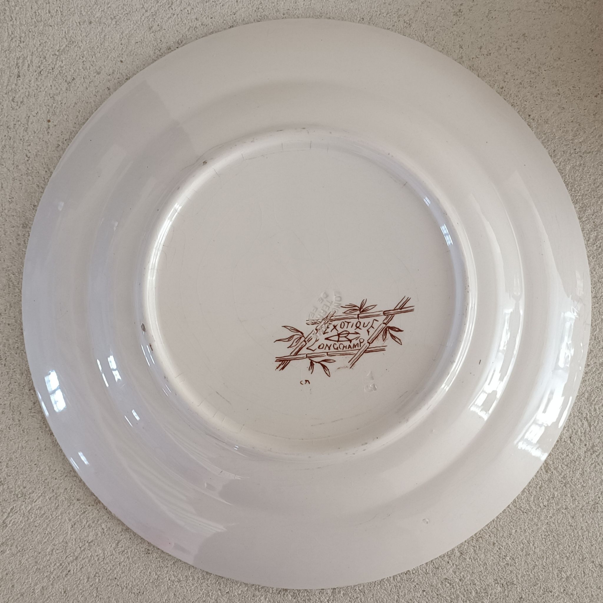 4 plates longchamp iron earth