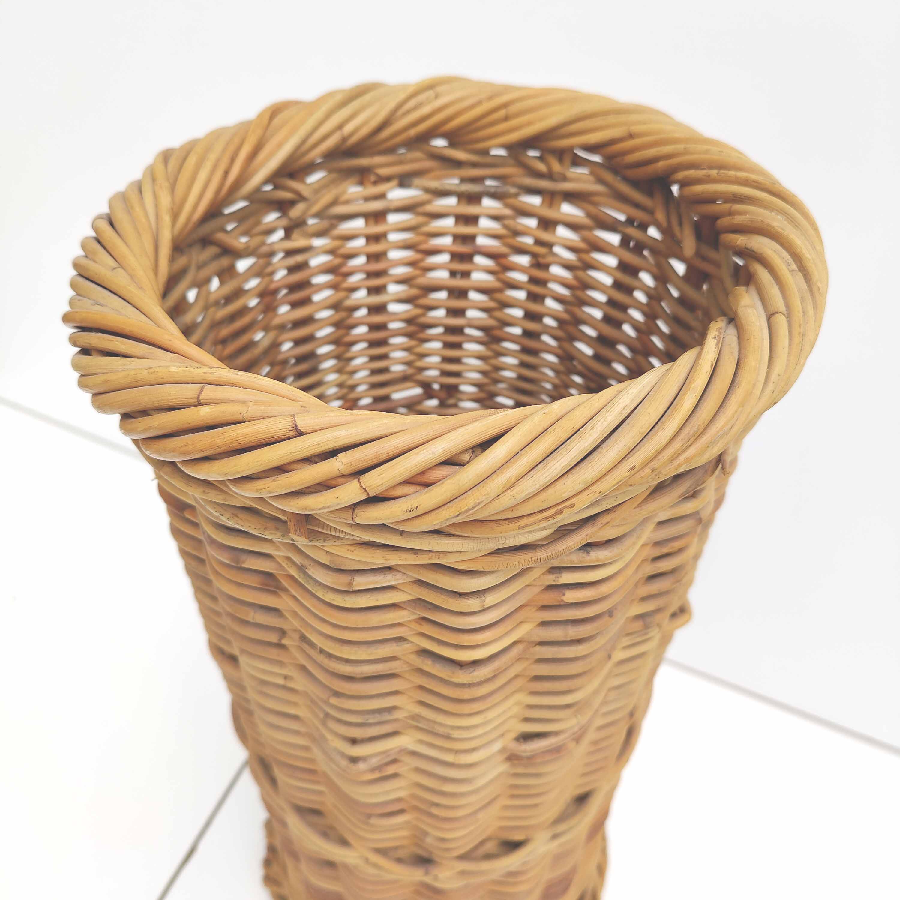 Vintage woven wicker umbrella holder