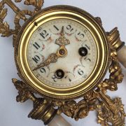Clock fireplace trim and two vases in onyx and bronze style Louis XVI