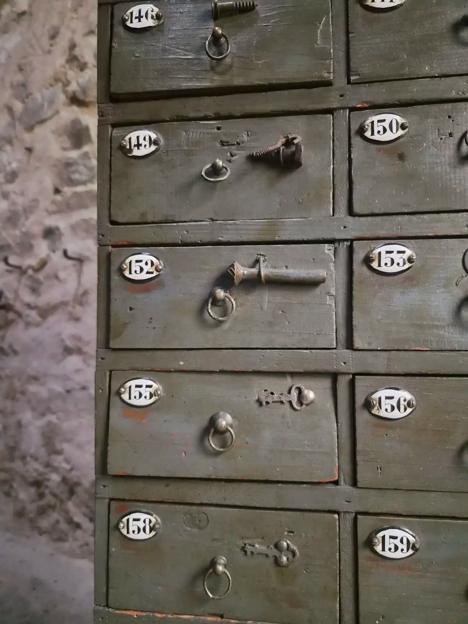 Antique hardware cabinet with 48 drawers, circa 1900.