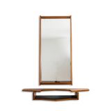 Mirror and its console in mahogany. 1970s.