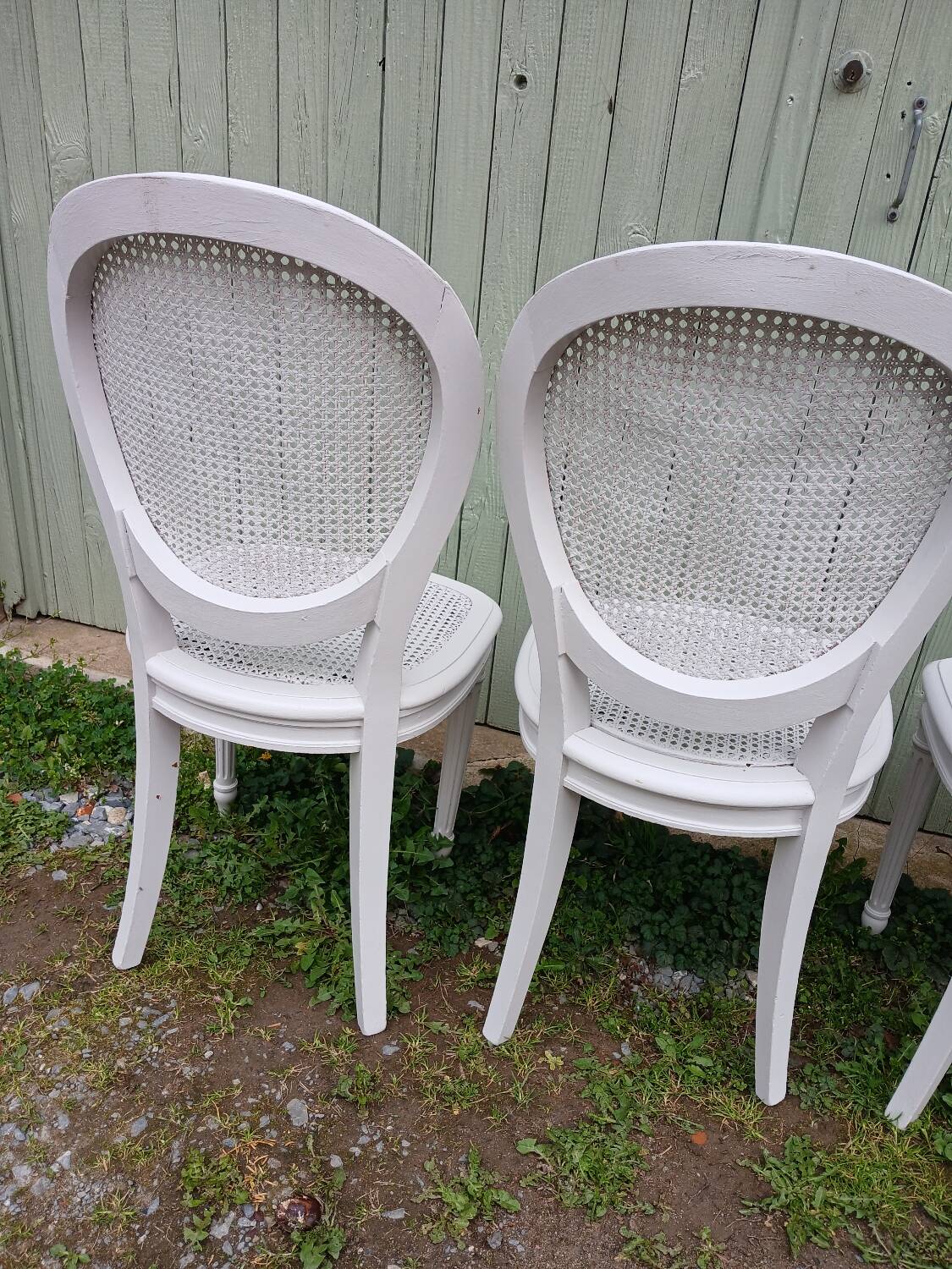 4 old wooden and cane chairs