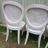 4 old wooden and cane chairs