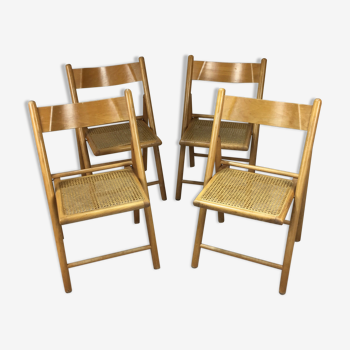 Lot de 4 chaises pliantes en bois cannées années 1970