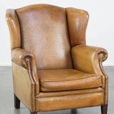 Sheep leather wingback chair with patina