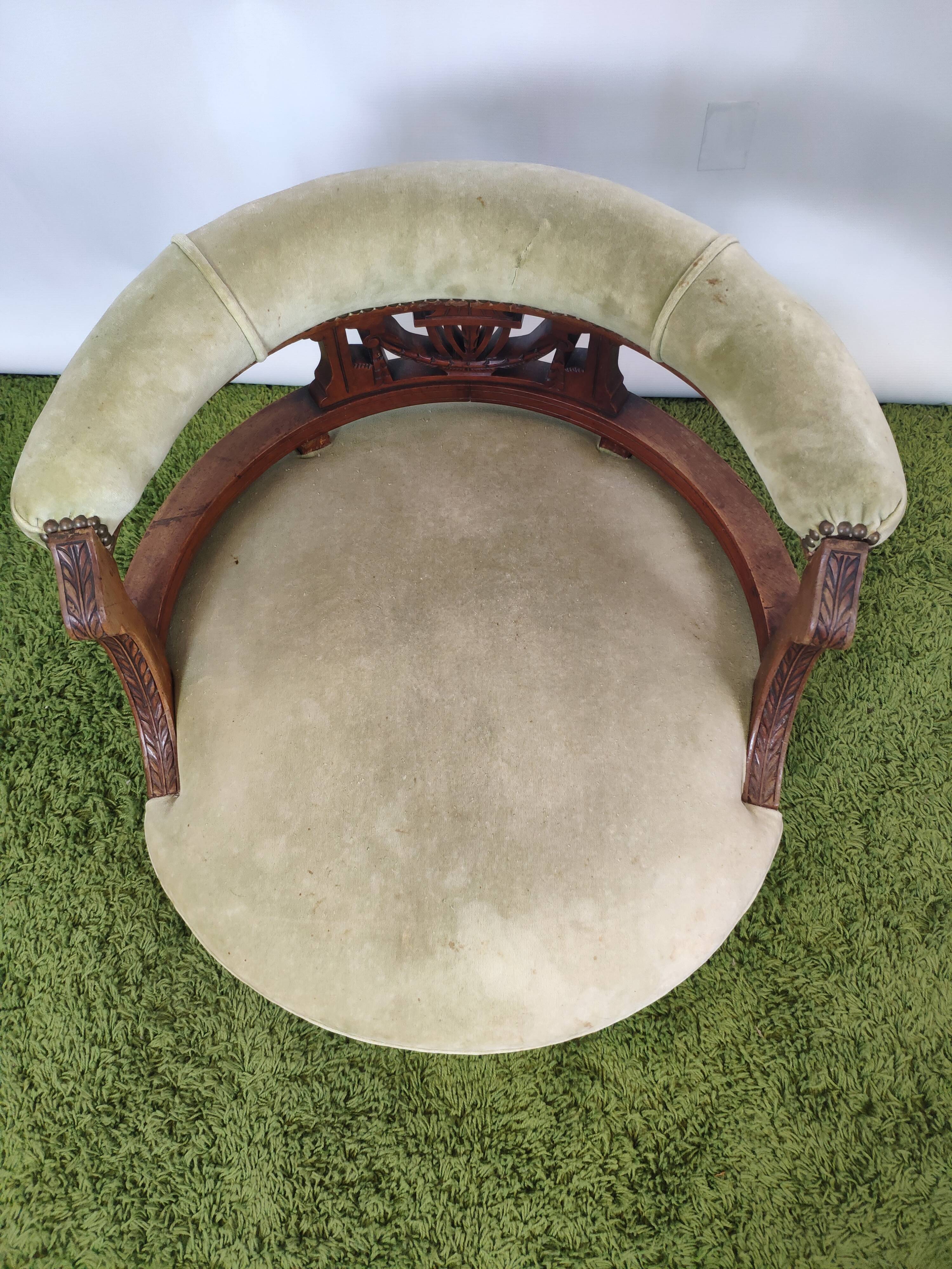 Old green velvet empire chair